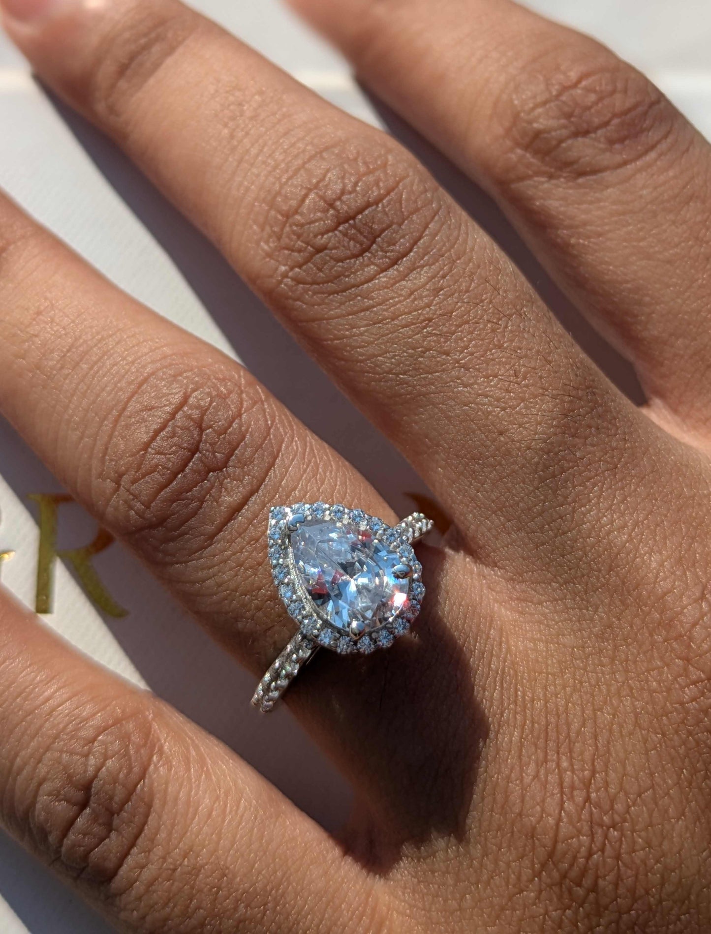 Harper Pear Halo Solitaire Silver Ring