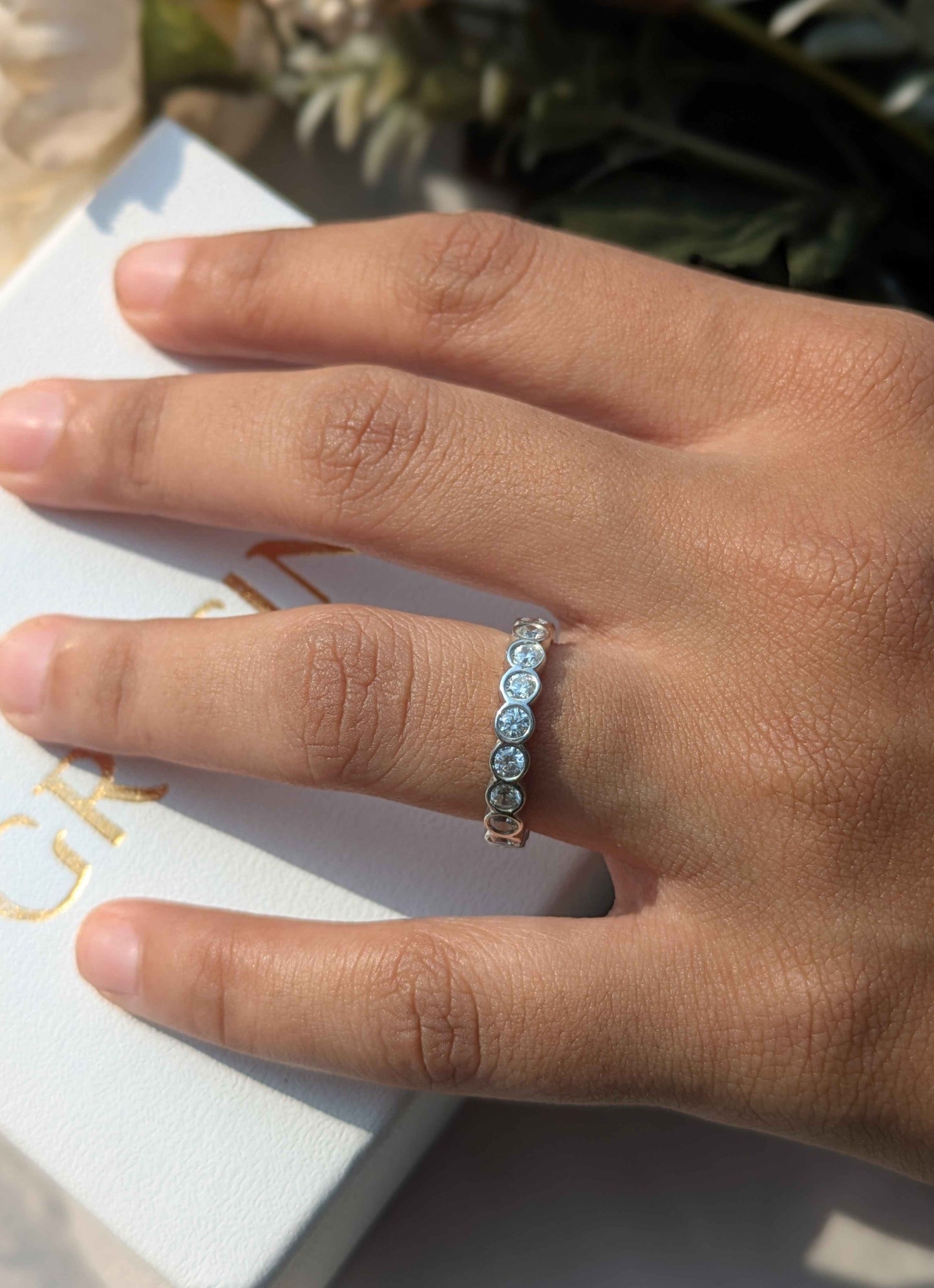 Round Bezel Set Eternity Silver Band For Women