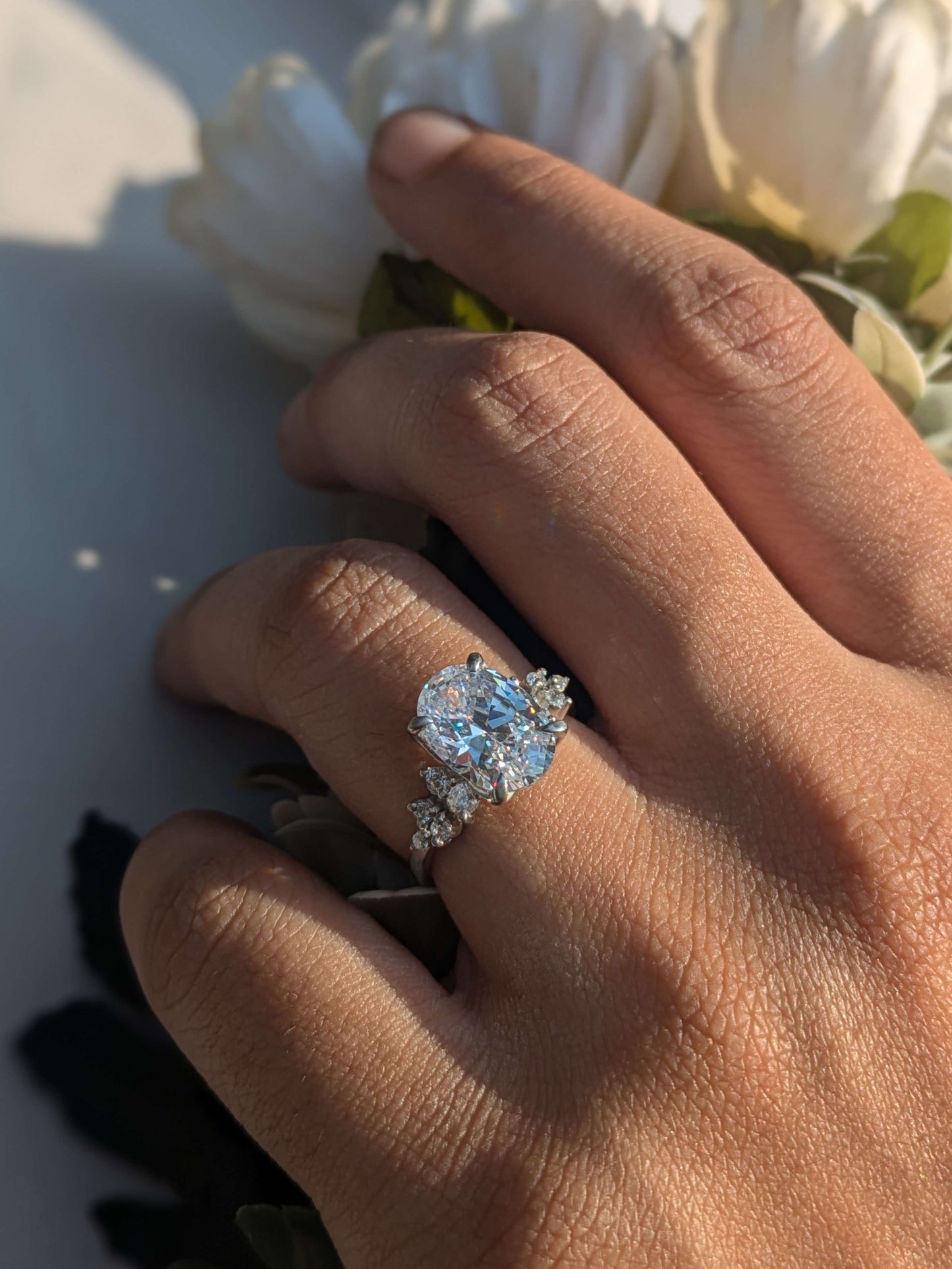 Feris Silver Oval Solitaire Accents Ring