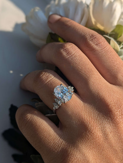 Feris Silver Oval Solitaire Accents Ring