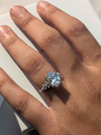 Feris Silver Oval Solitaire Accents Ring
