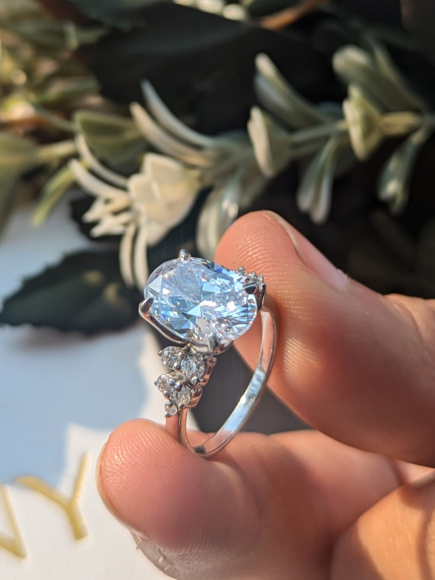 Feris Silver Oval Solitaire Accents Ring