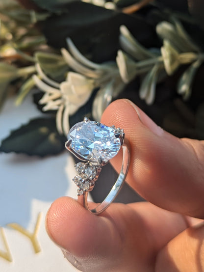 Feris Silver Oval Solitaire Accents Ring
