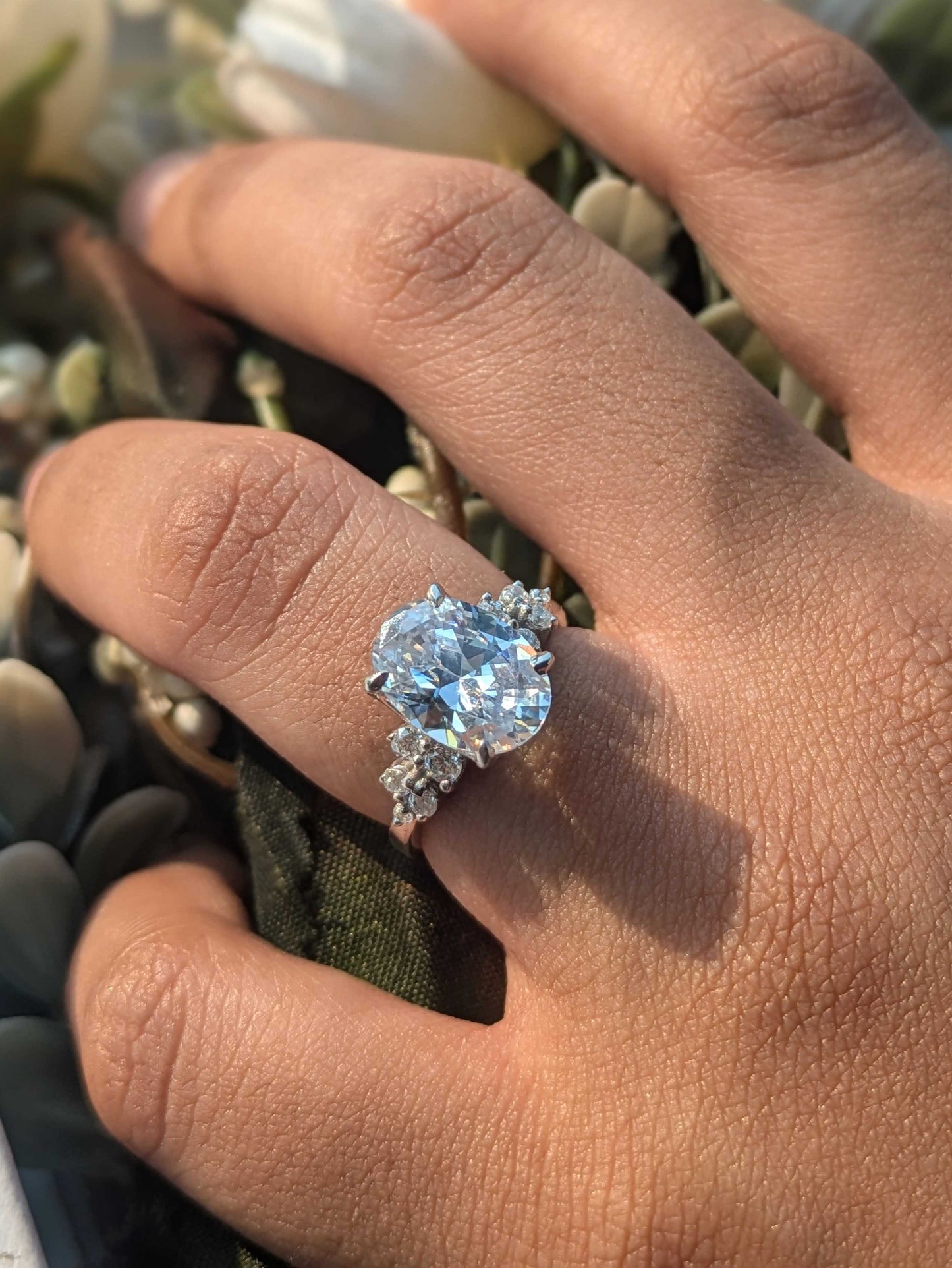 Feris Silver Oval Solitaire Accents Ring