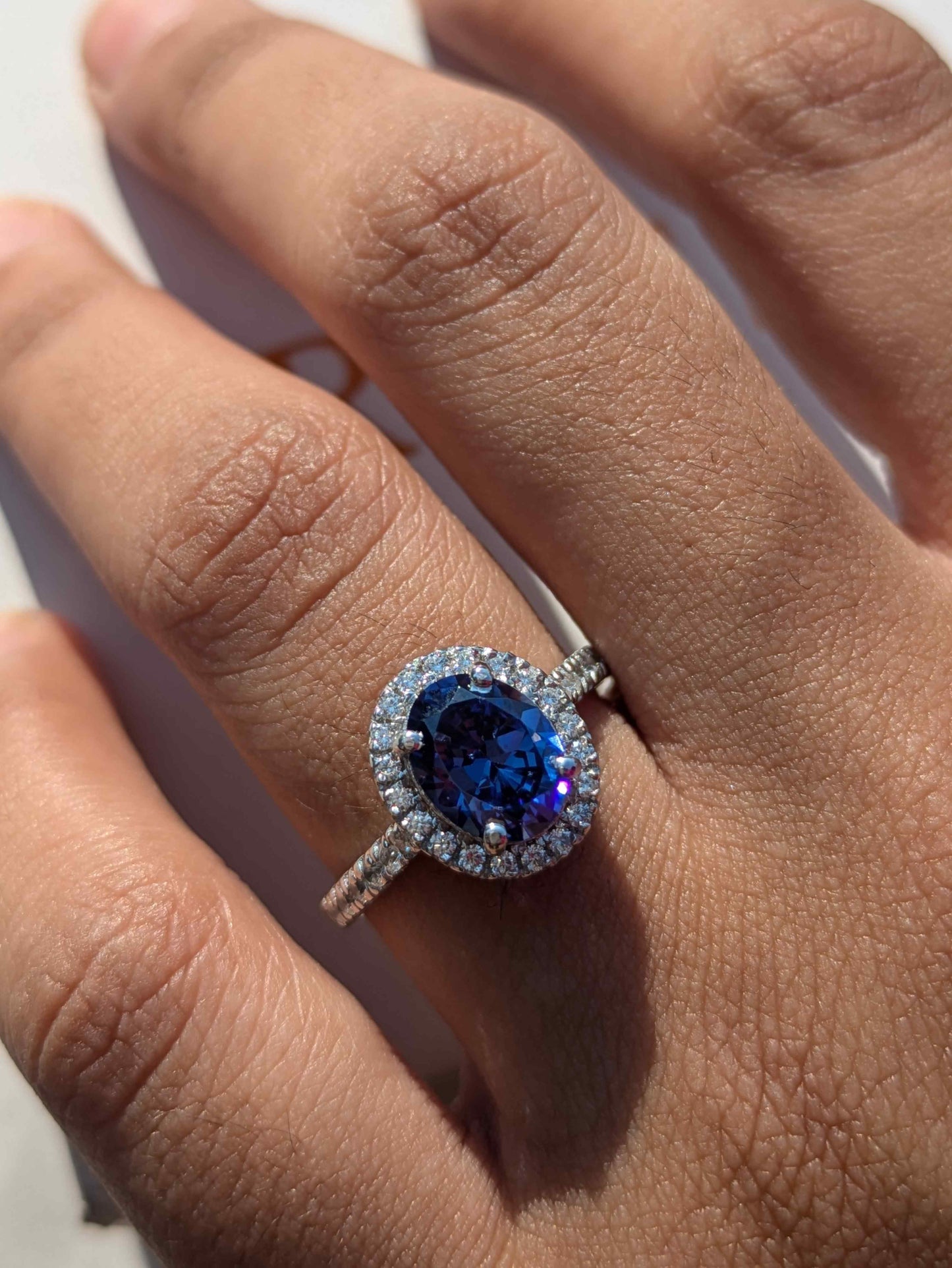 Blue Tanzanite Oval Halo Solitaire Silver Ring