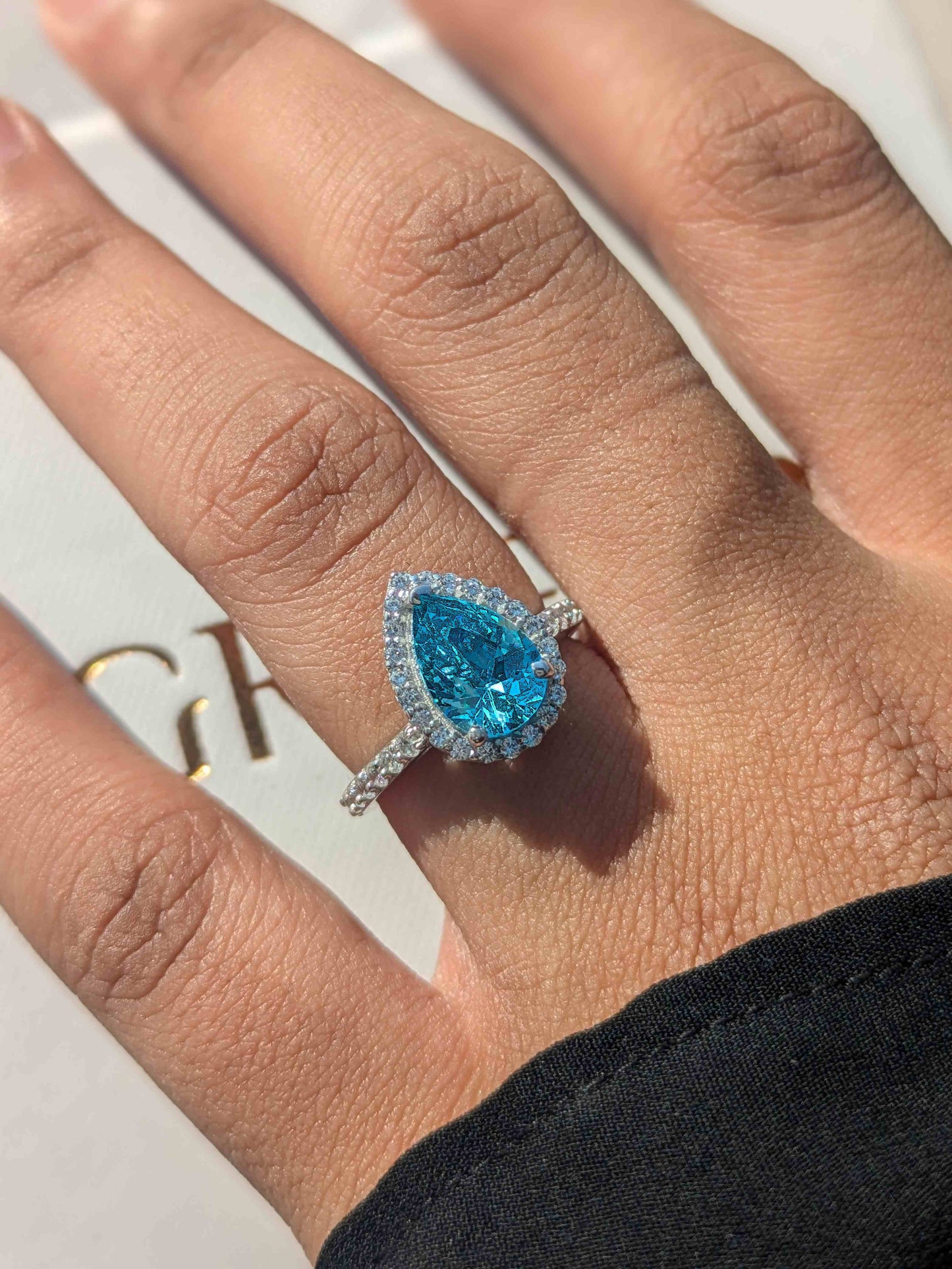 Aquamarine Pear Halo Solitaire Silver Ring