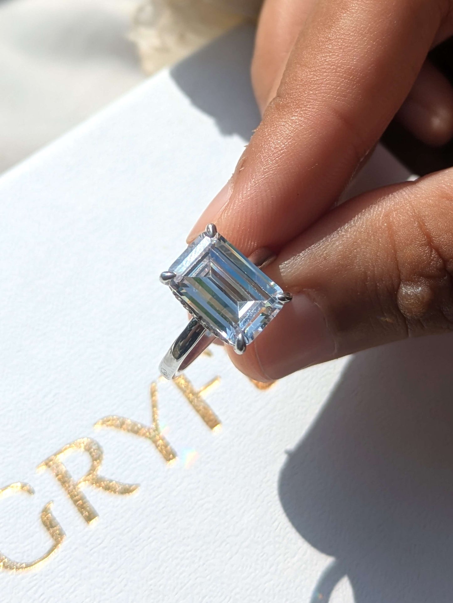 Ariana Emerald Hidden Halo Solitaire Silver Ring