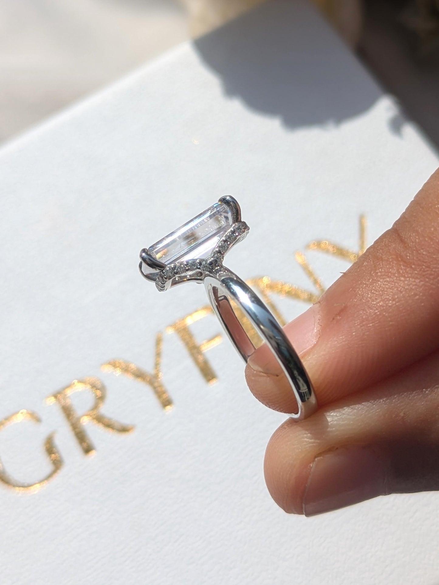 Ariana Emerald Hidden Halo Solitaire Silver Ring
