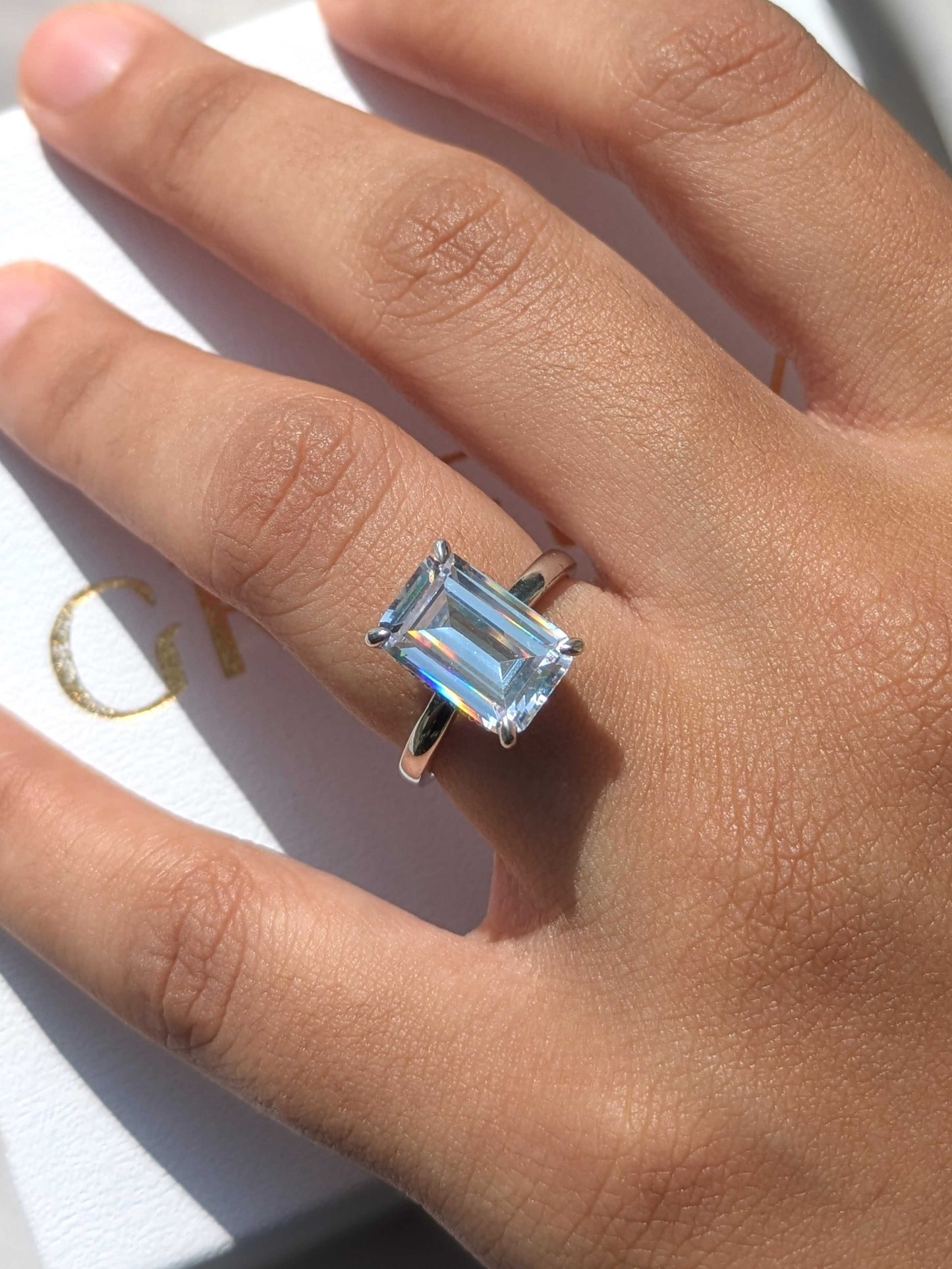 Ariana Emerald Hidden Halo Solitaire Silver Ring