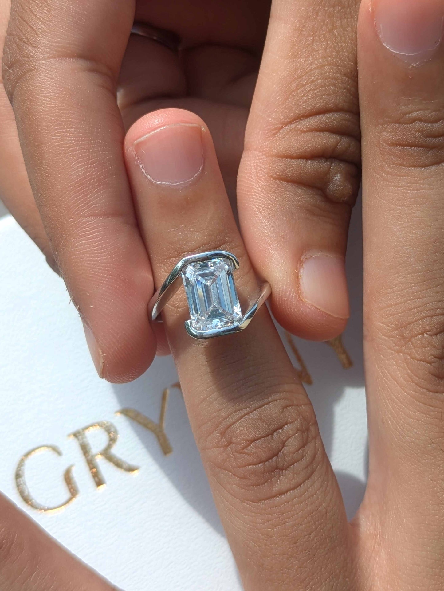 Zoey Emerald Half Bezel Solitaire Silver Ring