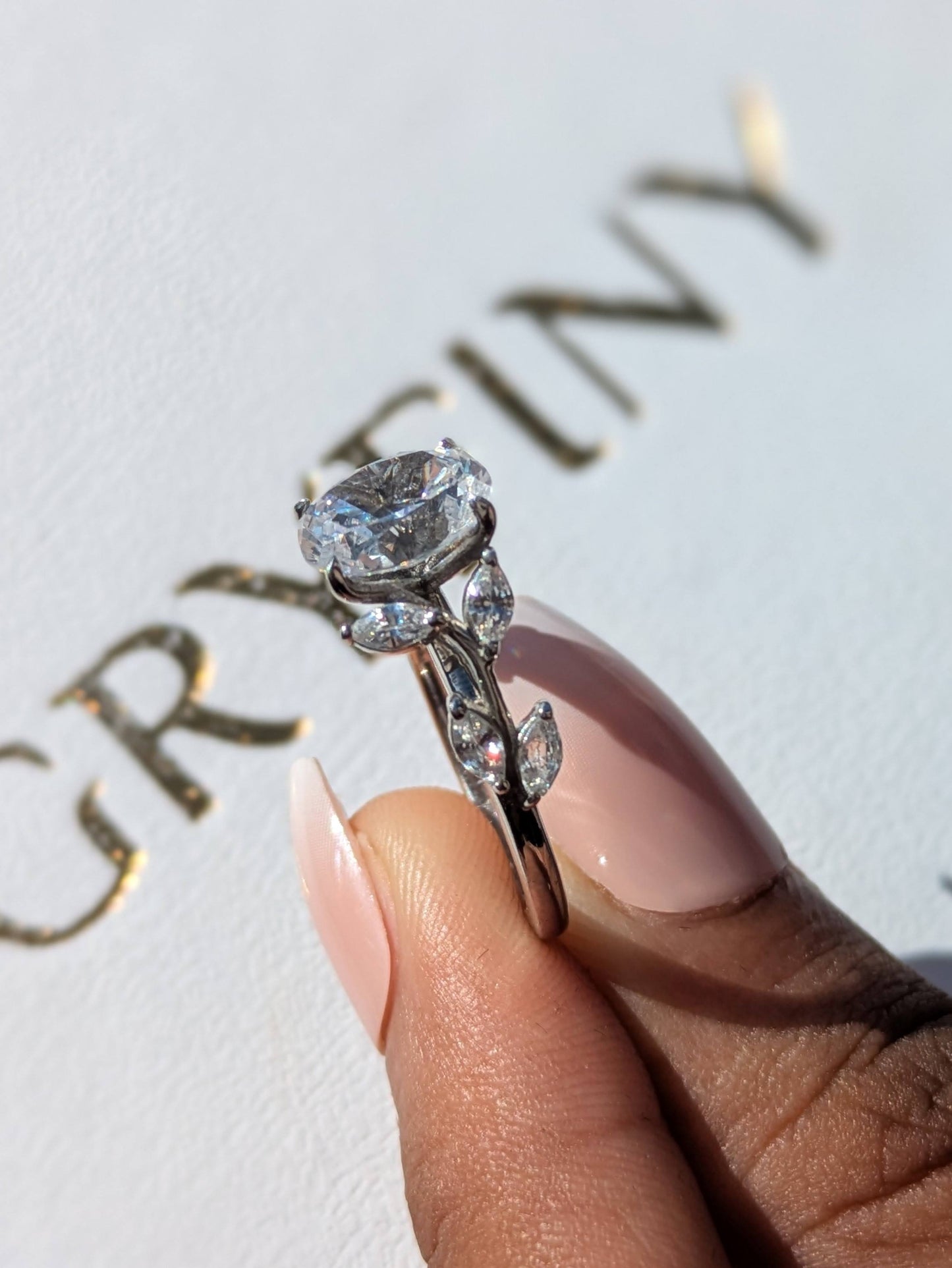 Casey Floral Shank Oval Silver Solitaire Ring