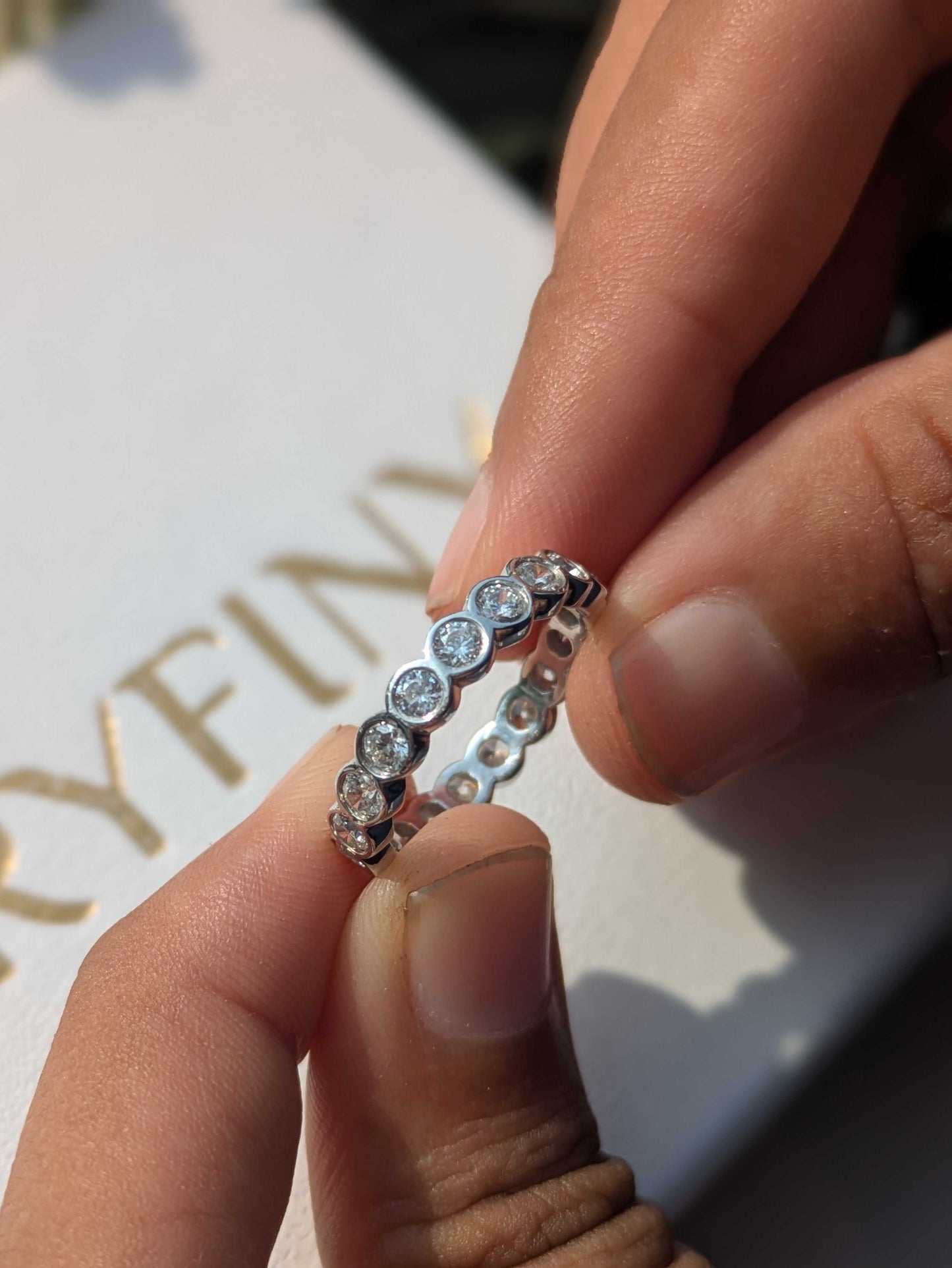 Round Bezel Set Eternity Silver Band For Women