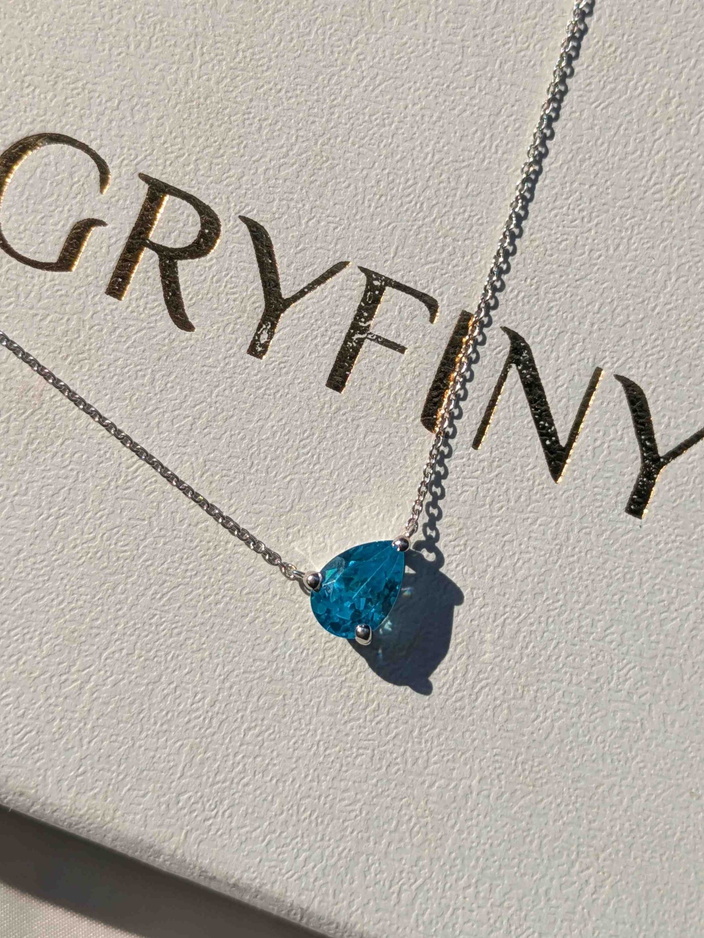 Aqua Marine Dia Pear Silver Slant Pendant For Women